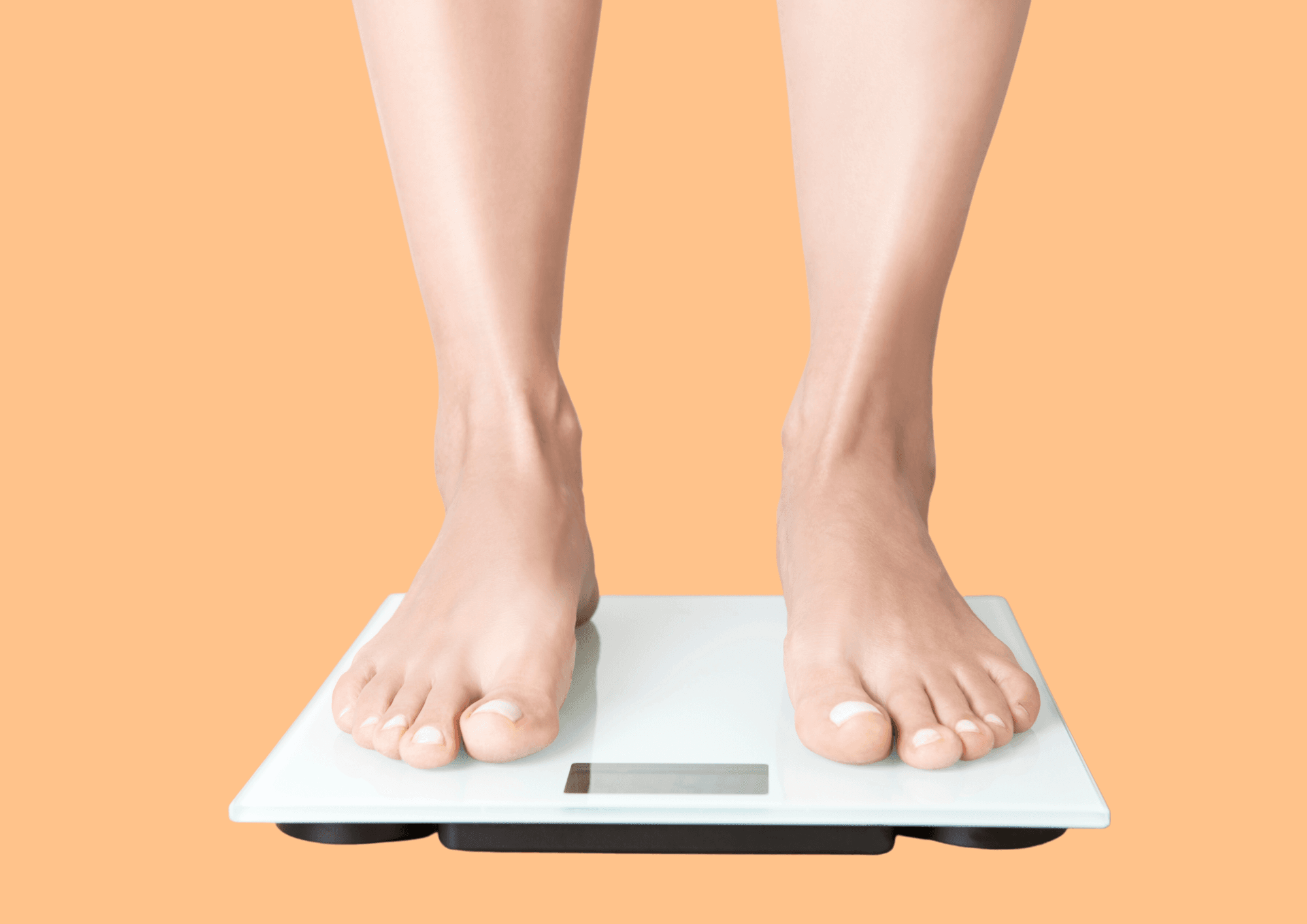 Woman standing on a scale.